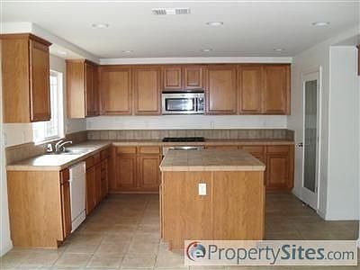 4th image of 10976 Wild Berry Ln