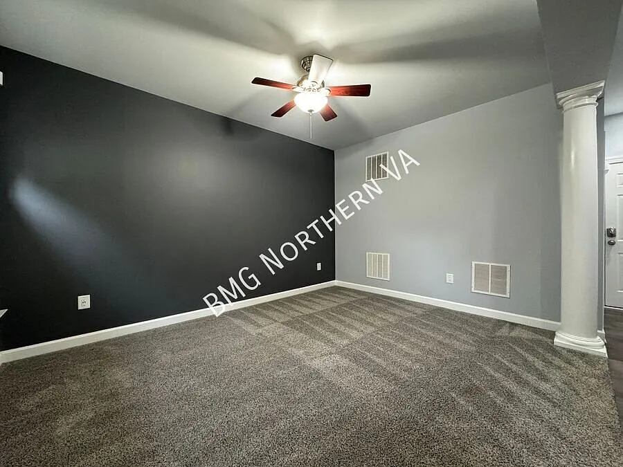 Coming Soon Spacious 3-Level Townhome with 2-Car Garage & Community Amenities in New Bristow Village — Photo 4