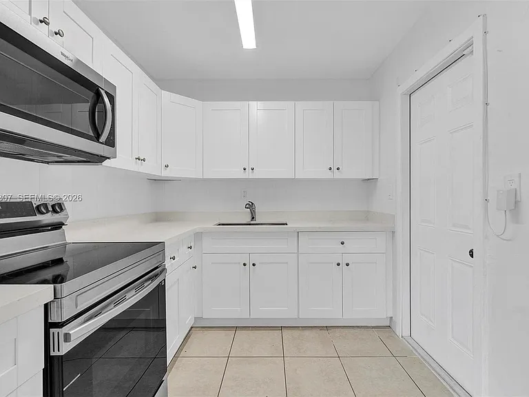551 NW 30th Ter — Photo 7
