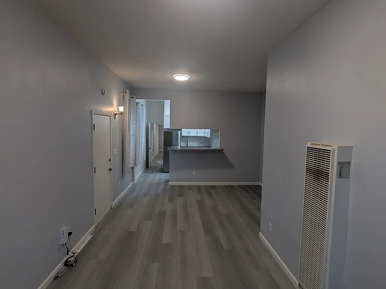 Living room and front door.