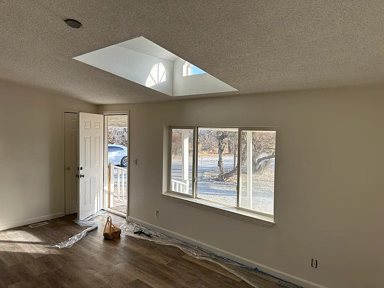 Living room with skylight.