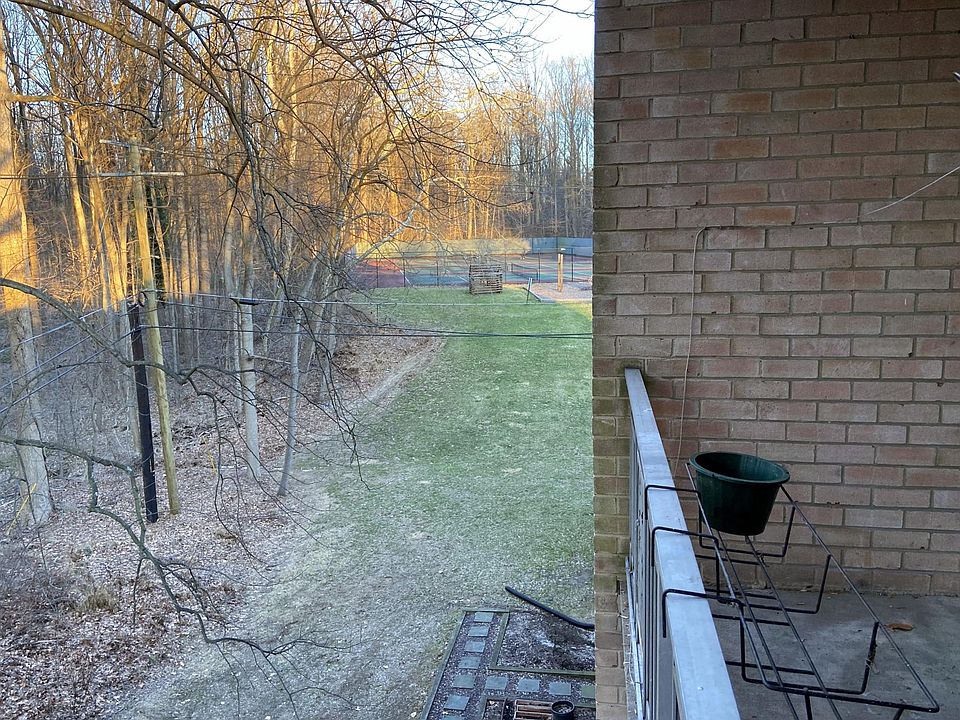 From the balcony, one can see the tennis courts.