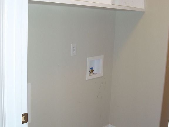 Laundry room with pantry area
