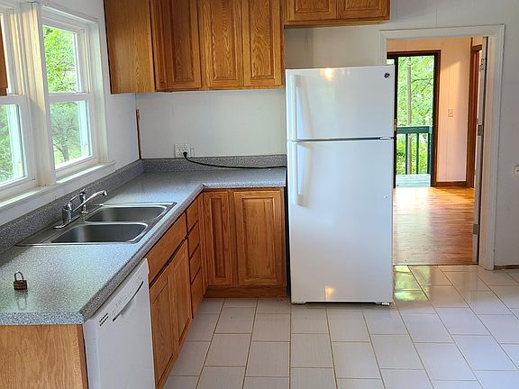 The side door enters into the kitchen