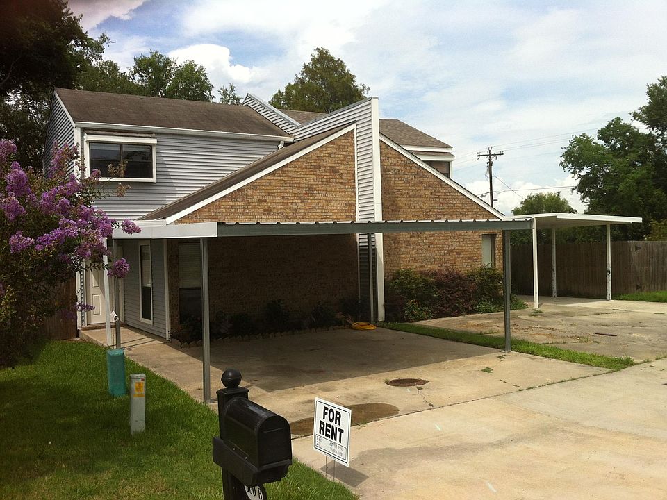 Unit on left - double carport