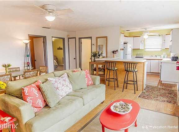 A bank of oceanfront windows and cool, airy comfort!