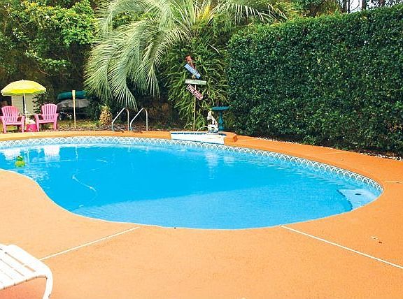 Private pool area with fish fountain