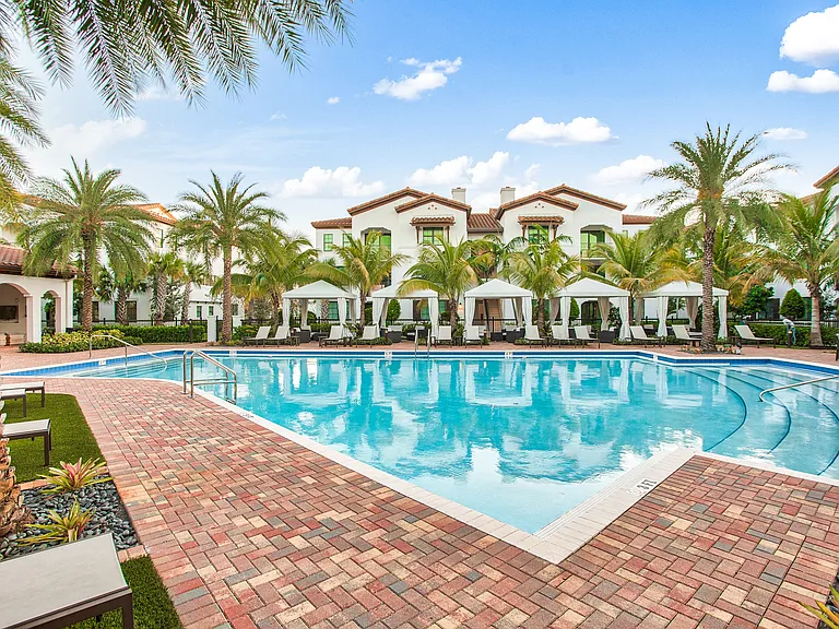 Two resort-style pools with cabanas