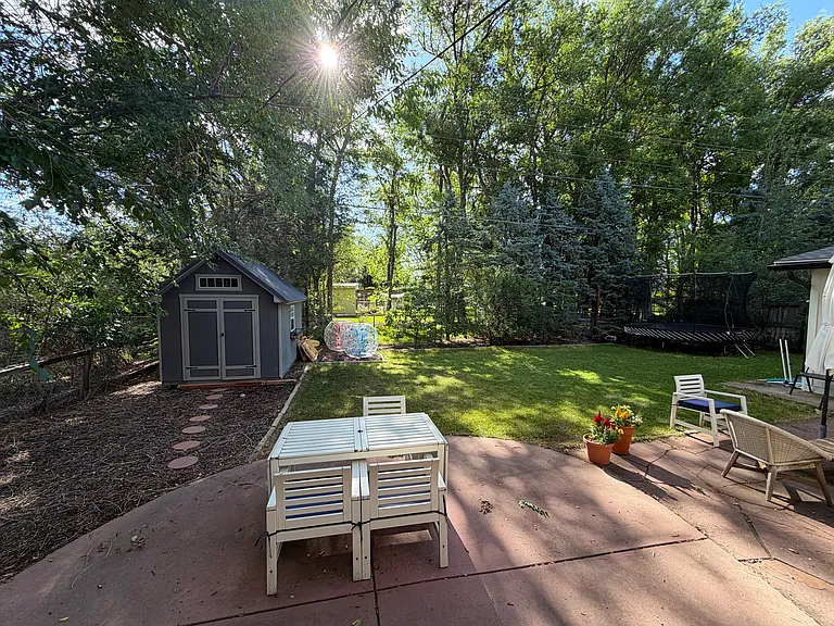 Backyard with storage shed and lots of privacy