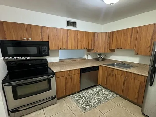 5241 Geneva Way #202 Photo 1