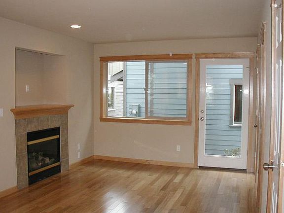 View of living room with Gas FP & ample storage