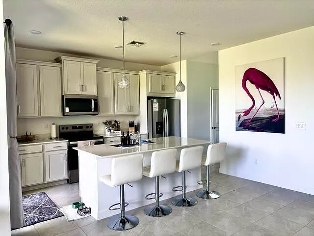 14043 SW Thorens Dr — Photo 2