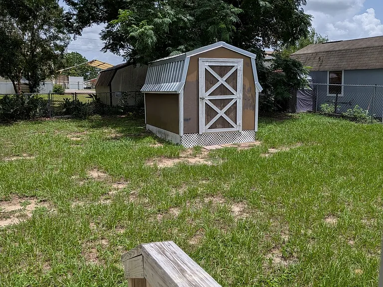 Large shed in fully fenced backyard
