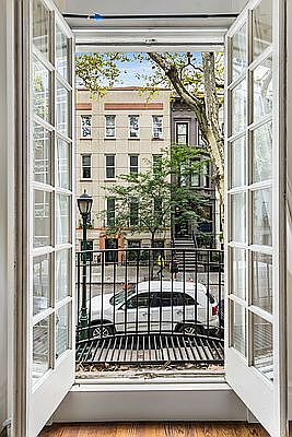 1st image of 119 E 64th St APT 2A