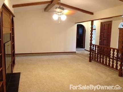 Living/Entry
						:
						Large living room with vaulted ceiling, updated lighting, tiled entry