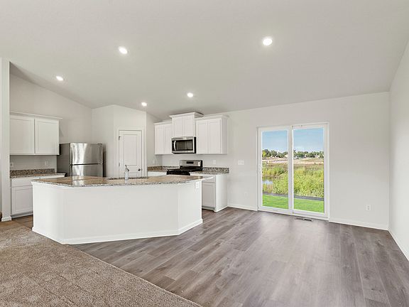 The dining room is off of the chef ready kitchen.