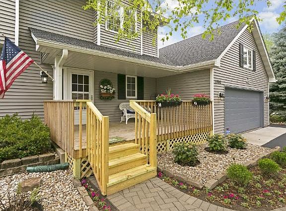 New front porch allows for peaceful views and wonderful conversation outdoors.