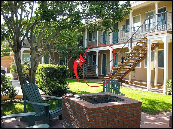 View to the grass area and BBQ