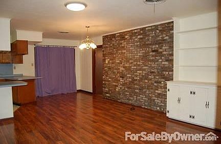 Den/Breakfast Area
						:
						Opens to Kitchen and Living Room