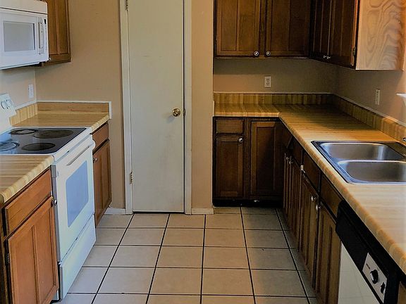 kitchen with windows to view the green backyard!
