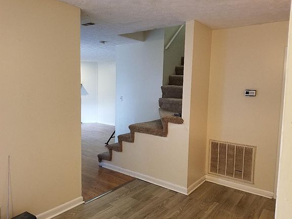 Stairs. Railing will be on stairs once furniture is moved in upstairs
