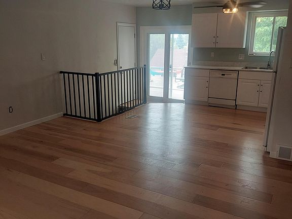 Living room looking into dining and kitchen area