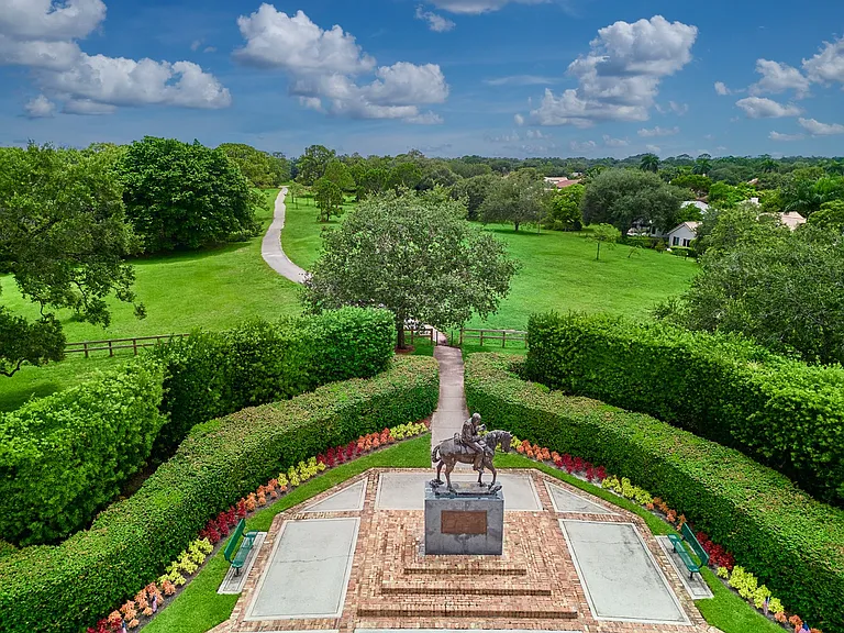 Statue of Major Lauderdale and Pine Island Ridge Trail (path to Tree Tops Park)