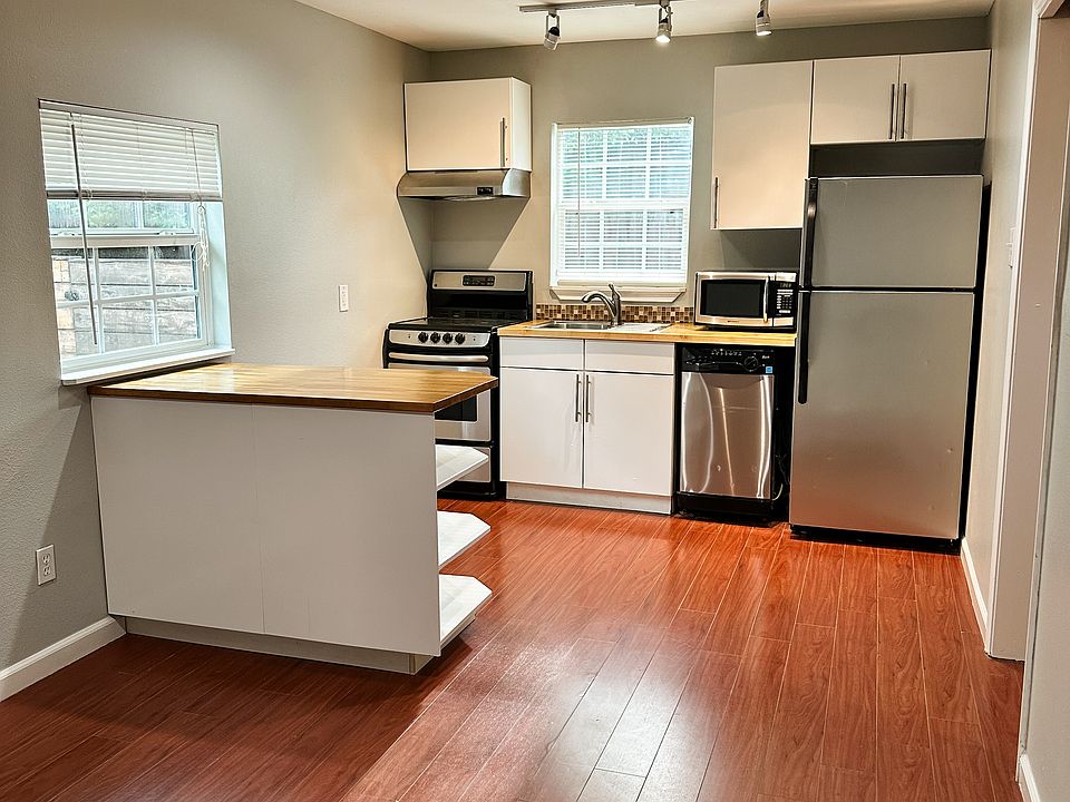 Efficient kitchen with appliances provided as shown.