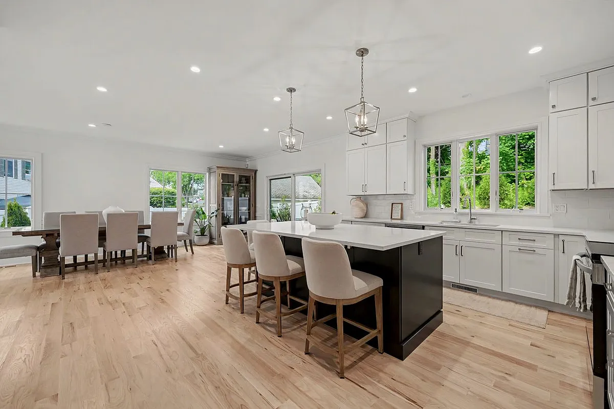 A thoughtfully designed 4,000 square-foot coastal layout unfolds with sun filled, open concept living spaces, seamless indoor/outdoor flow. - 185 S Water St