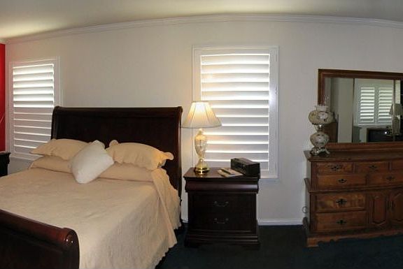 The master bedroom is spacious and welcoming.