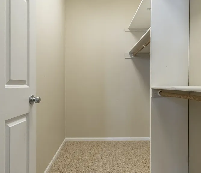 Spacious walk-in closets provide plenty of room to keep your wardrobe organized and accessible.