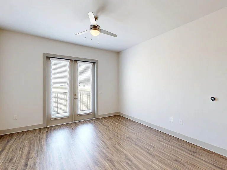 Apartment Living Room with Wood Style Flooring and Patio/Balcony.