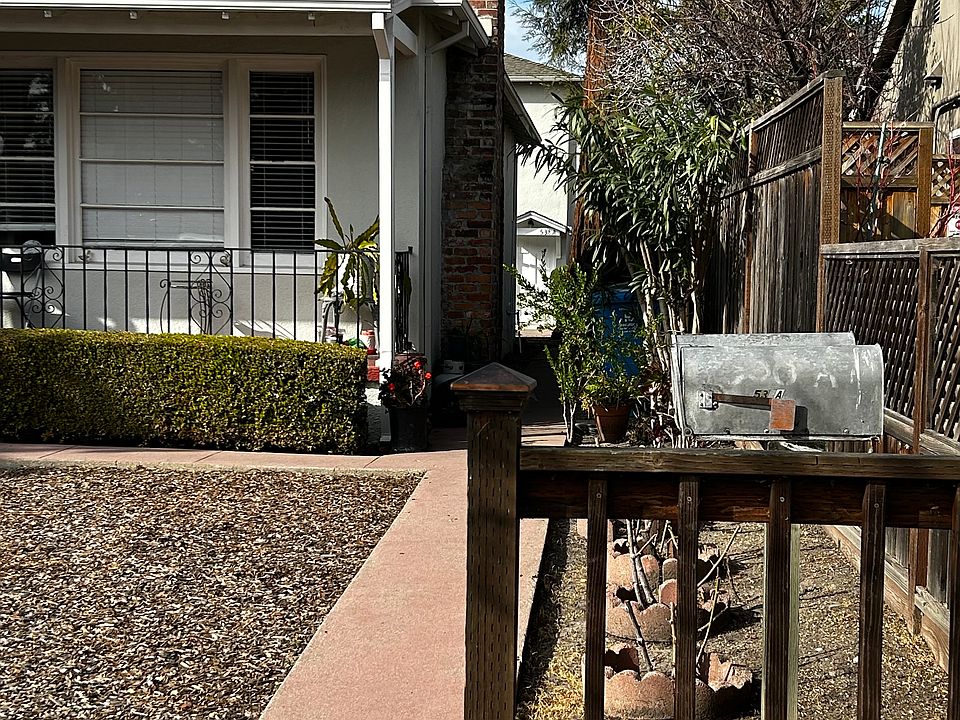 Walkway from front of property past the front unit to your unit in the rear of the property. 2 story - living space over garages.
