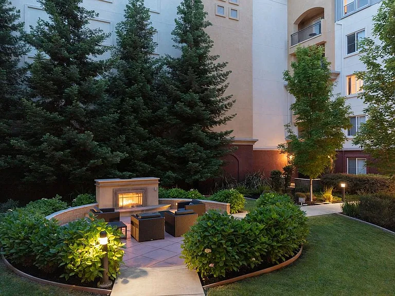 Courtyard with fireplace and lounge seating