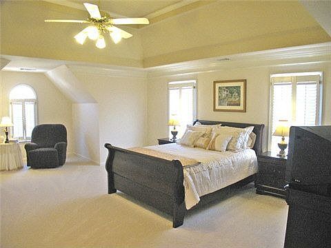 Super-sized master suite with sunny sitting alcove