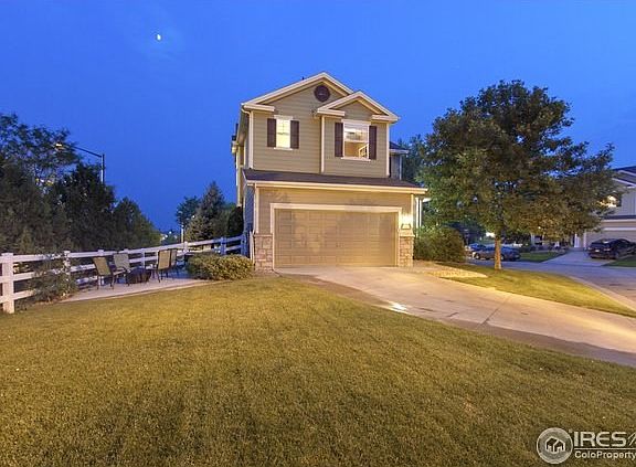 Side yard and patio beside home