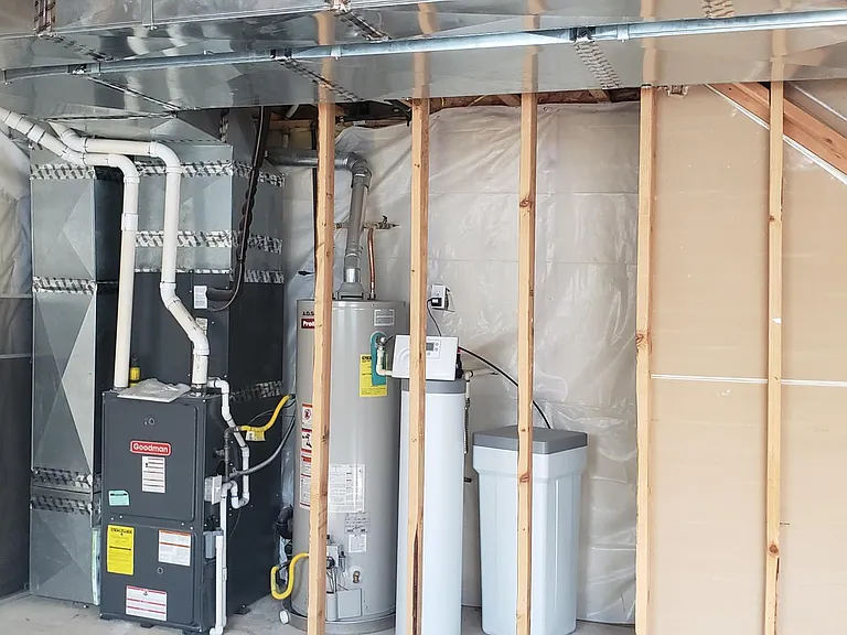 Comfortable home with gas heat, air conditioning, and water softener.