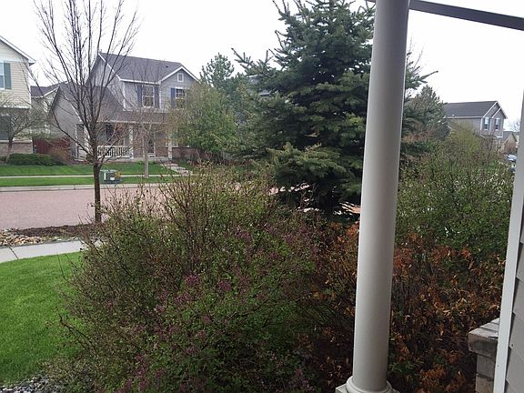 Lovely front porch area; perfect for enjoying the beautiful outdoors.