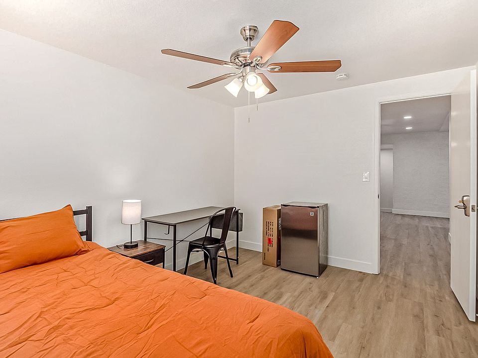 Full size bed, desk and chair and mini fridge.