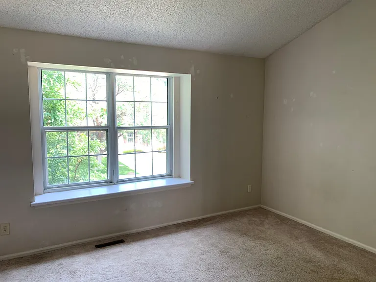 2nd bedroom, vaulted ceilings, attached bath.