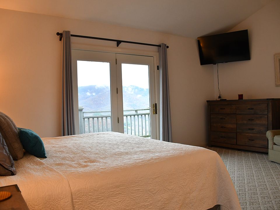 Master bedroom double doors to private deck