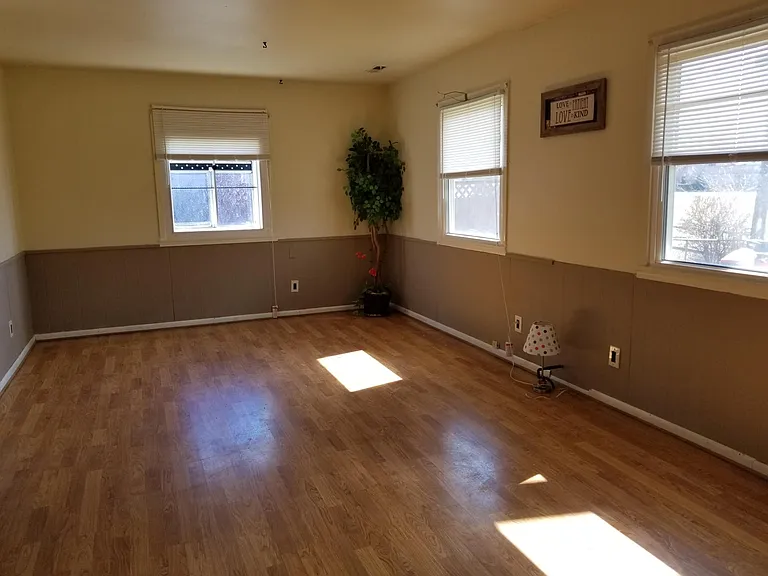 Family Room with energy windows throughout house