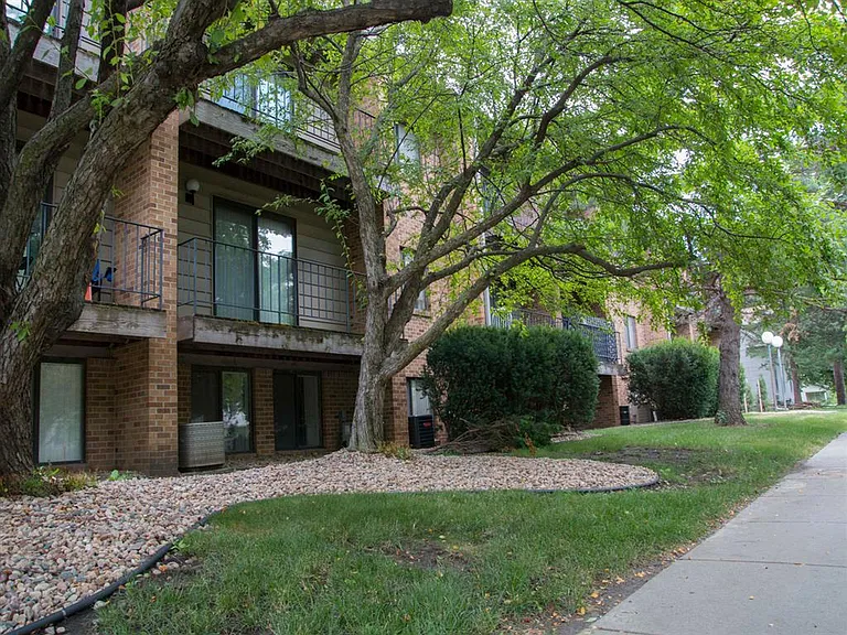 Relax in the shade of mature trees and enjoy private patio or balcony access in this peaceful garden-style community.