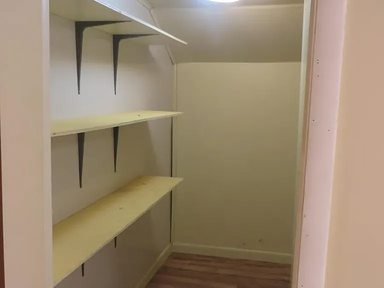 Large bedroom closet (walk-in)