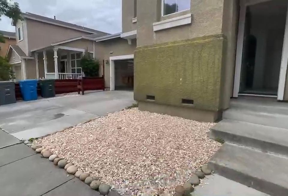 Main entrance. Low maintenance front yard