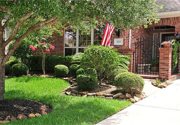 Lush landscaping and attention to detail make this home special.