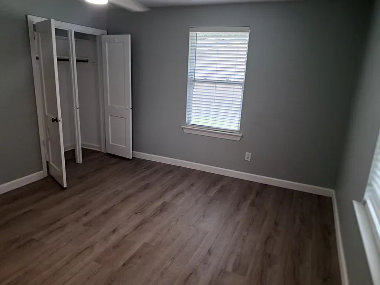 Guest bedroom 2 with double closet doors