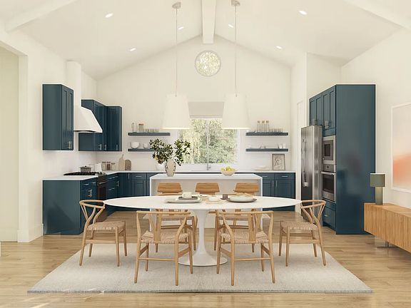Dining area with vaulted ceiling