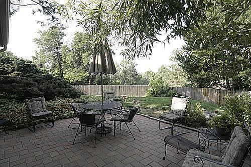 Sitting on a high corner lot, the backyard offers mountain views.