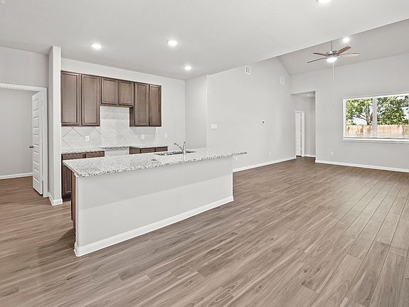 Kitchen, Dining Area, and Family Room